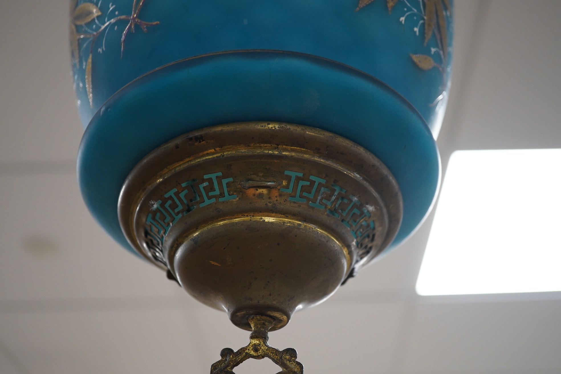 A Biedermeier enamelled blue glass hanging lamp, 36cm high. Condition - fair.